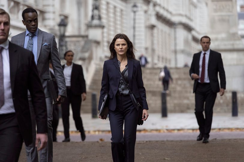 The Diplomat. (L to R) Ato Essandoh as Stuart Heyford, Keri Russell as Kate Wyler in episode 7 of The Diplomat. Cr. Alex Bailey/Netflix © 2023