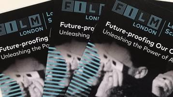 Pile of conference leaflets