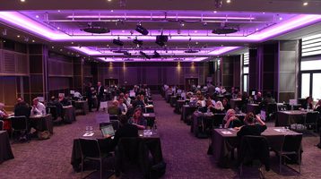 Production Finance Market. Rows of tables for meetings