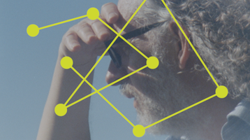 A softly focused portrait of an older person with curly grey hair shielding their eyes with one hand. Bright yellow dots connected by lines are superimposed across the image, forming a geometric network that overlays the figure’s face and body. The contrast between the human subject and the graphic intervention suggests themes of mapping, connection, or data visualisation.