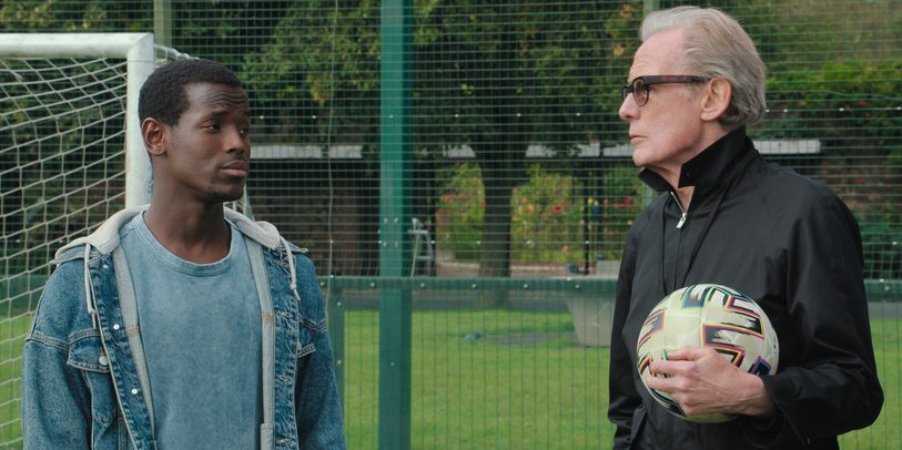 Michael Ward and Bill Nighy in The Beautiful Game, Netflix (2024)